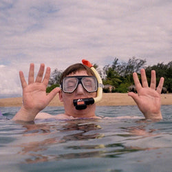 E-commerce and I.T. manager of Great Outdoors, Paul O'Neill, having a relaxing snorkel along the Great Barrier Reef