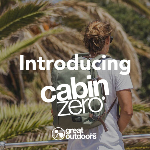 Introducing Cabin Zero at Great Outdoors - Cabin Zero logo over an image of woman wearing backpack.