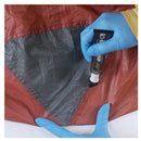 Applying seamgrip WP waterproof sealent to the seams of a tent using a brush
