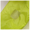 Applying tenacious tape silnylon patches to a hi-vis yellow silnylon material