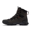 The Columbia Mens GeoTerra OutDry Leather Hiking Boot in black/dark brown features a high ankle, rugged Vibram sole, red lace accents, and back pull loop, shown from the side against a white background.