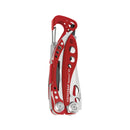 The Leatherman Skeletool RX Multitool, shown folded in red and silver with cutout details and a carabiner clip, is a compact, essential tool for first responders in emergency situations.