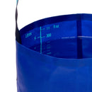 A close-up of the Sea to Summit Folding Bucket (10L), filled to approximately 9 liters, showing measurement markings in liters and fluid ounces on the inside.