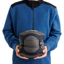 A person in a blue fleece jacket holds the Sea to Summit Circuit Down Sleeping Bag (-9°C), a compact gray and black sleeping bag, centered against a plain background—an ideal choice for cold-weather camping thanks to its 650+ fill power Ultra-Dry duck down insulation.