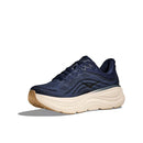 The Mens Bondi 9 Road Running Shoe by Hoka features a navy blue upper, thick white sole, and tan rubber outsole, displayed angled on a plain white background.