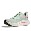 The Hoka Womens Clifton 10 Wide Running Shoe features a light green upper, white sole, black tread, and red accents on the side and tongue, displayed against a plain white background.