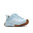 Light blue Hoka Womens Transport 2 athletic shoes feature a thick, textured brown rubber sole, a mesh and synthetic upper, lace-up closure, and a slightly raised heel—these sustainable running shoes are photographed against a white background.