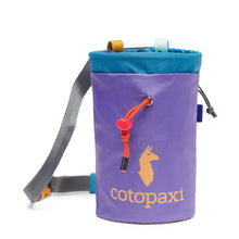 A Cotopaxi Halcon Chalk Bag - Del Día made from repurposed nylon features a llama logo, blue rim, colorful drawstrings, and a gray adjustable waist strap. The purple climbing chalk bag stands upright against a white background.