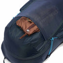 A close-up of the Cotopaxi Elqui 18L Backpack in navy blue, crafted from recycled nylon for both style and sustainability. The backpack features a small brown zippered pouch partially tucked into its outer pocket, with distinctive blue zipper pulls—perfect for your next adventure.