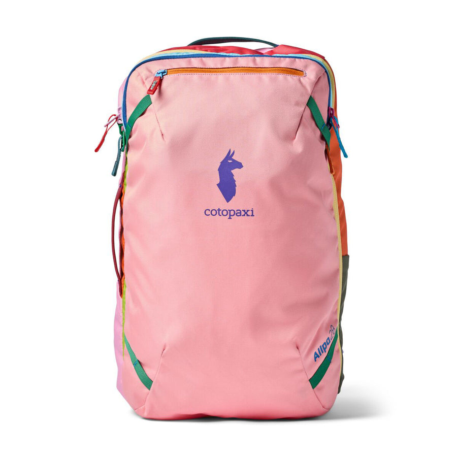 A vibrant Cotopaxi Allpa 28L Travel Pack - Del Día, featuring colorful zippers and accents, a purple llama logo, and the Cotopaxi name on the front—a sustainable backpack thats perfect for your next adventure.