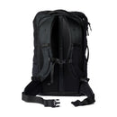 A rear view of the Cotopaxi Allpa 35L Travel Pack in black, highlighting its padded shoulder straps, chest strap, padded back panel, and padded hip belt with a plastic buckle. Made with recycled fabrics for durability, it also features visible zippers at the top.