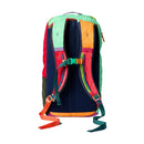 A vibrant Cotopaxi Allpa Mini 20L Travel Pack - Del Día, shown from the back with green, orange, red, and navy panels. This suitcase-style backpack features padded shoulder straps and a chest strap with buckles for added comfort and support.