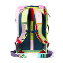 A vibrant, eco-friendly Cotopaxi Allpa 42L Travel Pack - Del Dia is displayed from the back, highlighting padded, adjustable shoulder straps in green, pink, blue, and purple with secure clips and buckles. The blue back panel features the yellow GEAR FOR GOOD text. This backpack also offers a practical suitcase-style opening for effortless packing and easy access to your essentials.