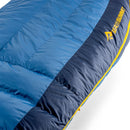 Close-up of a blue and navy Circuit Down Sleeping Bag (-1°C) with yellow trim. The Sea to Summit logo is visible on the navy section near the edge, highlighting this lightweight sleeping bag ideal for two-season use.