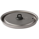 A round, gray metal pan lid by MSR, made to fit the Titan Kettle 900mL camping pot. It features a black handle on top and a small steam vent hole, with raised lettering visible on its surface. The lid is shown against a white background—making it an essential addition for ultralight backpacking cookware or use with the MSR Titan Kettle 900mL.