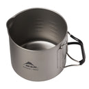 The MSR Titan Kettle 900mL is a titanium camping mug featuring a black folding handle and internal measurement lines, offering ultralight performance and dependable cookware for backpacking adventures.