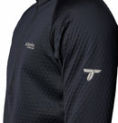 Close-up of a person wearing a black Columbia Mens Crystal Leaf Omni-Heat Helix Technical Half Zip Fleece featuring a textured pattern, chest logo, and upper sleeve logo.