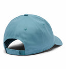 A light blue Columbia Provisions Ball Cap is shown from the back, featuring an adjustable back closure and a curved brim. This cotton cap from Columbia has stitched eyelets for ventilation and a button on top.