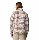 A person with long brown hair, seen from the back, is wearing the Columbia Mens Helvetia II Printed Half Snap Fleece in shades of pink, white, and green with beige pants against a plain white background.