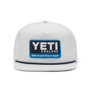 White cap with a YETI Coolers logo on a white background