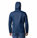 A person is seen from the back wearing a Columbia Mens Pouring Adventure™ III Waterproof Hiking Jacket and blue pants, standing against a plain white background.
