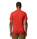 A man faces away from the camera, wearing a Columbia Mens Zero Rules™ Light Technical T-Shirt in bright red and tan cargo shorts, shown against a plain white background.