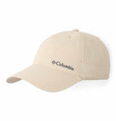 The Columbia Schooner Bank II Cachalot Hat is a light beige hiking hat with a curved brim and black Columbia logo on the front left panel, offering stylish sun protection and shown against a plain white background.