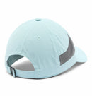 The Columbia Tech Shade II Cap in light blue is shown from the back, with a black side mesh panel and an adjustable buckle strap—perfect as a lightweight hiking hat.