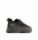 A side view of a black and gray Columbia Mens Tellurix Titanium Outdry Hiking Shoe features a thick, rugged Vibram Megagrip outsole, mesh upper, blue accent by the laces, and the Columbia logo on the heel.