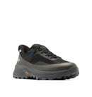 The Columbia Mens Tellurix Titanium Outdry Hiking Shoe is a black low-top waterproof hiker with rugged tread, mesh and synthetic upper, black laces, visible Vibram Megagrip outsole logo, and a sleek modern design.