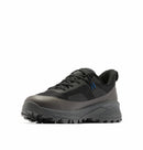 The Columbia Mens Tellurix Titanium Outdry Hiking Shoe features a black mesh upper, blue lace detailing, and a rugged Vibram Megagrip outsole, shown angled on a white background.