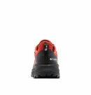 The Columbia Mens Tellurix Titanium Outdry Hiking Shoe in red and black is shown from the back, featuring visible heel support, a rugged Vibram Megagrip outsole, and Columbia Titanium branding on the side.
