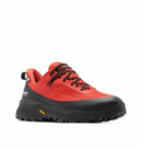 The Columbia Mens Tellurix Titanium Outdry Hiking Shoe is a red and black waterproof shoe with a rugged Vibram Megagrip outsole, black laces, reinforced toe cap, side branding, and a yellow Vibram logo on the sole.