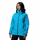 A woman with dark, shoulder-length hair stands against a white background wearing the Columbia Womens Saudan Pro™ 3L Shell Jacket in bright blue, looking to the side and ready for extreme weather protection.