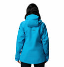A woman with long dark hair, seen from behind, wears the Columbia Womens Saudan Pro™ 3L Shell Jacket in bright blue Omni-Tech Pro for extreme weather protection, set against a plain white background.