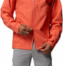 A person in the Men’s Trailborne 2.5L Waterproof Shell Jacket by Columbia, bright orange with light gray pants, is shown from the shoulders down zipping up the front with both hands.