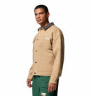 Man wearing a beige jacket with a Columbia brand logo on a white background