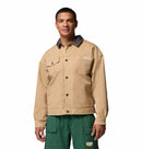 Man wearing a Columbia Acker Rock beige jacket and green pants on a white background