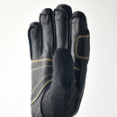 A close-up of a Hestra Army Leather GORE-TEX Short Glove, featuring yellow stitching and shown with the palm facing forward against a plain white background.