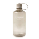 A transparent Nalgene 1L Narrow Mouth Water Bottle - Monochrome stands upright on a white background, featuring a screw cap with a flexible plastic loop attached to the lid. Made from BPA/BPS-free Tritan Renew material, this bottle delivers durability and peace of mind for everyday hydration.