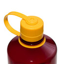 A close-up of the Nalgene 1L Narrow Mouth Water Bottle - Colour Block, featuring a vibrant red body with a bright yellow screw cap and attached yellow loop, made from durable, BPA-free Tritan Renew material, set against a white background.