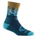 The Women’s Northwoods Micro Crew Midweight Hiking Socks by Darn Tough feature a blue and brown color scheme with teal accents, crafted in Vermont from soft merino wool. These socks showcase a forest and bear design with trees and mountains on the upper part.