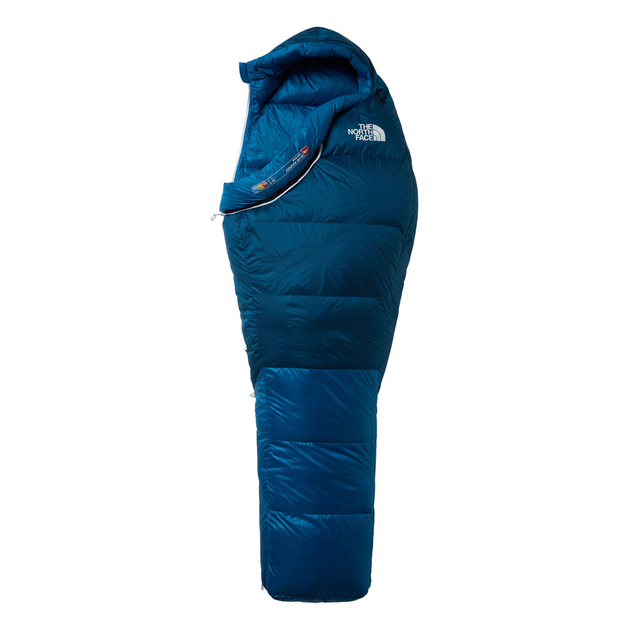 A blue Kazoo Down Sleeping Bag (-7°C) from The North Face, featuring a mummy shape with a hood and zipper and branded with The North Face logo near the top right side. Designed for three-season backpacking, it provides reliable warmth and comfort for your outdoor adventures.