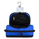 The North Face Base Camp Travel Washbag - Large in blue features a convenient hanging hook and opens to reveal mesh pockets and spacious compartments—ideal for anyone seeking durable travel accessories.