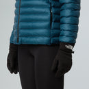 Teal puffer jacket and black gloves with The North Face logo on a light gray background