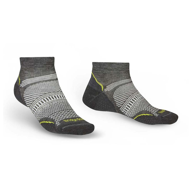 Pair of gray socks with patterned design on a white background