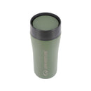 A green Lifeventure One-Touch Thermal Mug with a black one-touch lid is displayed against a white background. The brand’s logo and name appear vertically along the side of this sleek stainless steel mug.