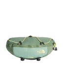 The North Face Terra 3-Litre Bum Bag in light green is crafted from recycled nylon and features a zippered main compartment, front pocket, and yellow logo. Designed with black pull tabs and a yellow zipper pull, this bag is perfect for carrying your hiking essentials.