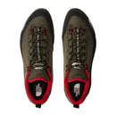 Top view of a pair of olive green Men’s Verto GORE-TEX Alpine Shoes by The North Face, featuring a red lining, black soles, and black-and-yellow laces. These waterproof hiking shoes are equipped with a durable Vibram outsole and display The North Face logo on both the insoles and the toe area of each shoe.