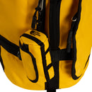 Close-up of a yellow backpack featuring black zippers and trim, with a small Base Camp Mini Duffel by The North Face attached to the front as a zippered pouch. This matching mini duffel, showcasing The North Face logo, doubles as a stylish keychain bag for your essentials.